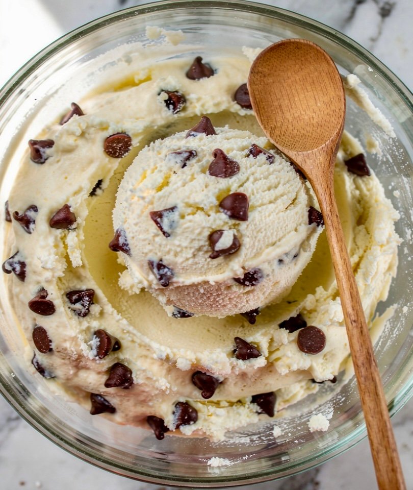A bowl of high-protein cottage cheese cookie dough mixed with dark chocolate chips