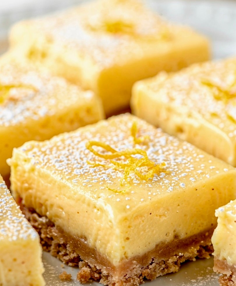 Creamy Easy No Bake Lemon Bars on a graham cracker crust.