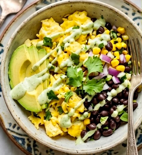 A delicious 10-Minute High Protein Breakfast Bowl topped with avocado and salsa.