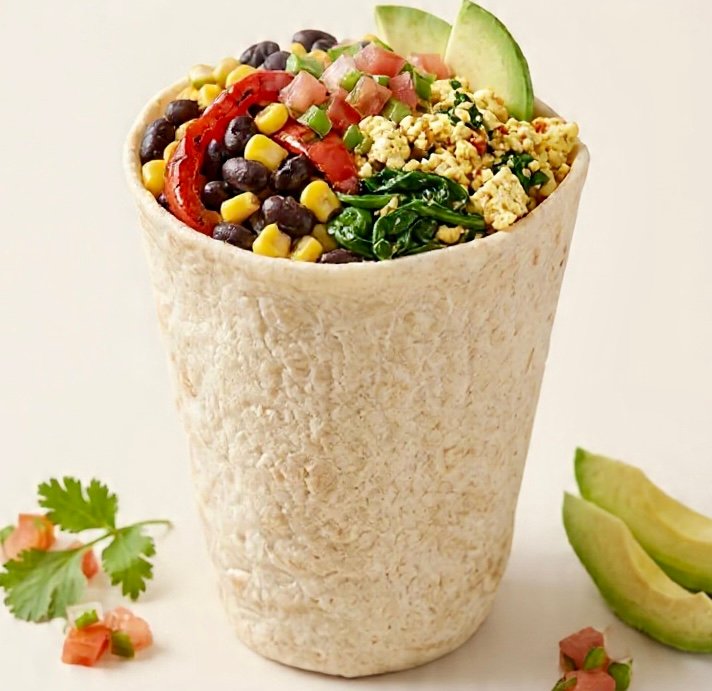 vibrant Healthy Veggie Power Bowl Tortilla Breakfast featuring a crispy whole-wheat tortilla bowl filled with roasted sweet potatoes, kale, and avocado.